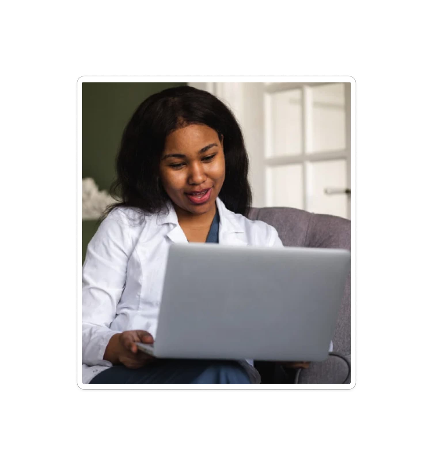 Woman using laptop for online therapy